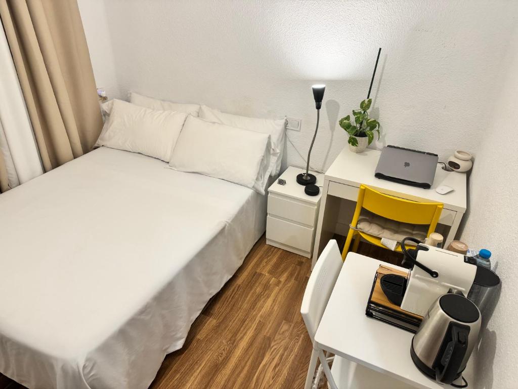 Postel nebo postele na pokoji v ubytování Habitacion sencilla en piso hogareño
