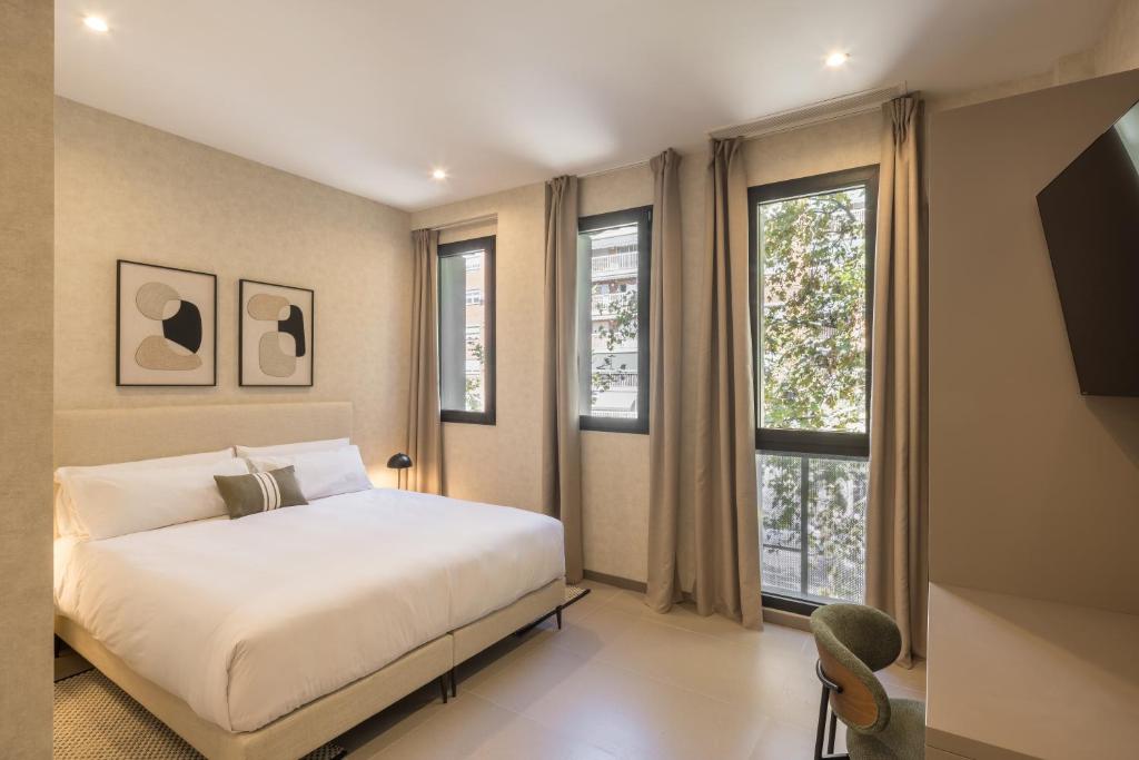 Katil atau katil-katil dalam bilik di Housing Maritim by SharingCo