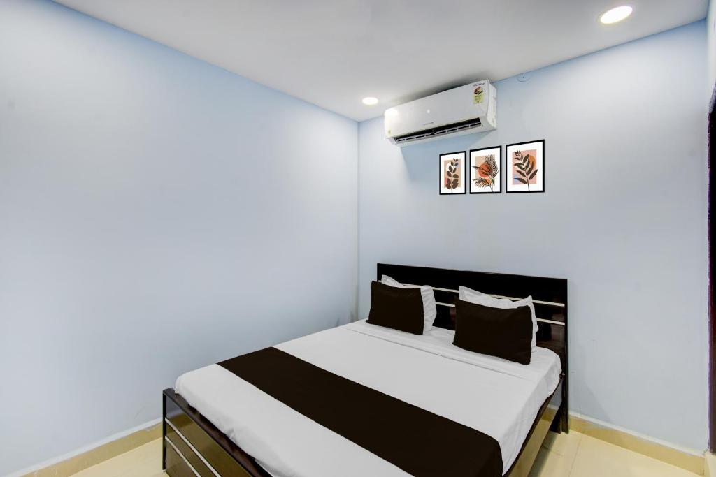 Ένα ή περισσότερα κρεβάτια σε δωμάτιο στο Hotel O Stayo