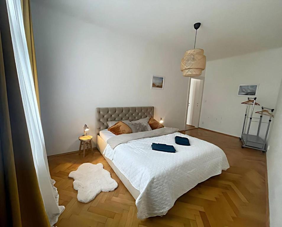 En eller flere senge i et værelse på Apartmá