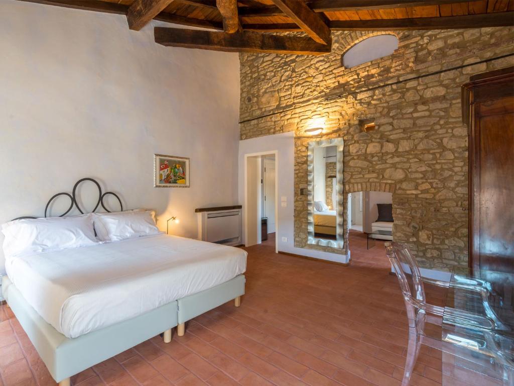 Postel nebo postele na pokoji v ubytování Borgo Cadonega