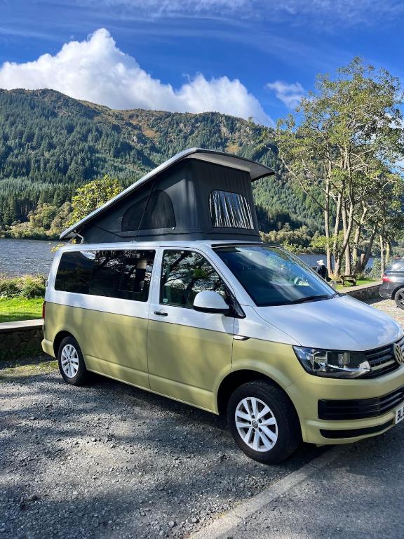 a small van with a roof rack on top of it at Campervan Scotland, Ben Roamer in Dunblane