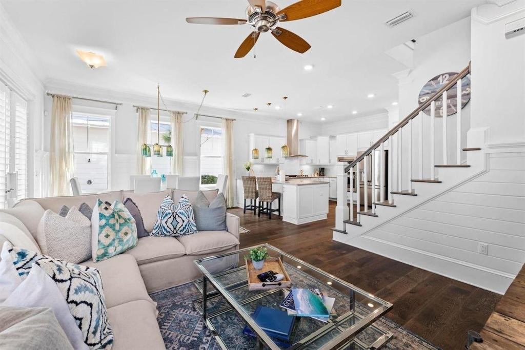a living room with a couch and a table at It's a Shore Thing in Inlet Beach