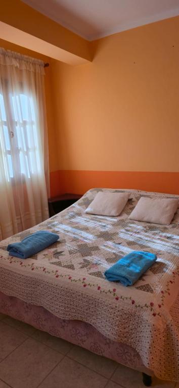 Ένα ή περισσότερα κρεβάτια σε δωμάτιο στο Tierra del Sol