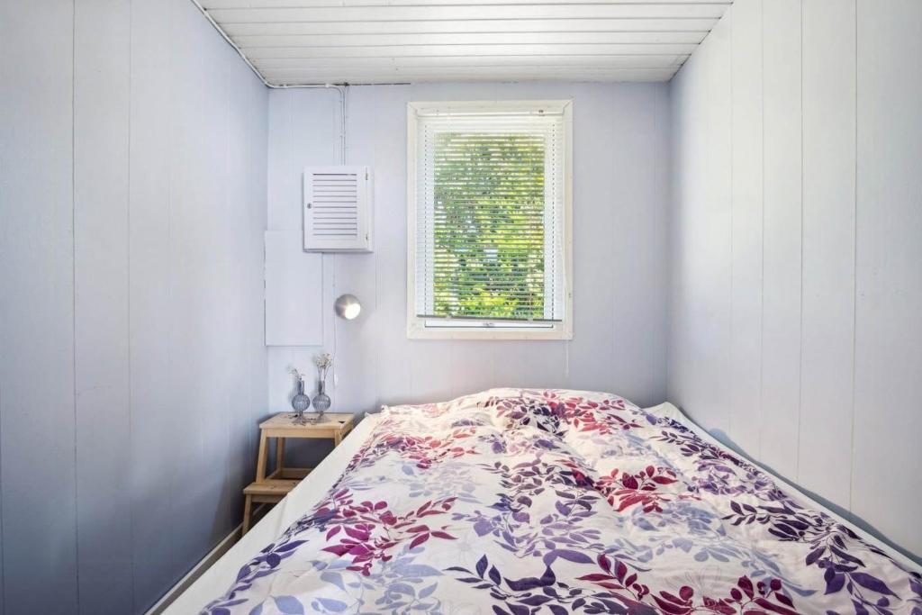 Giường trong phòng chung tại Holiday Home With Fjord Views At Horsens Fjord