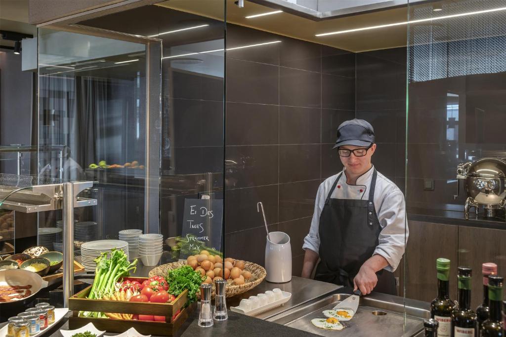 NH Collection München Bavaria - Resim 22