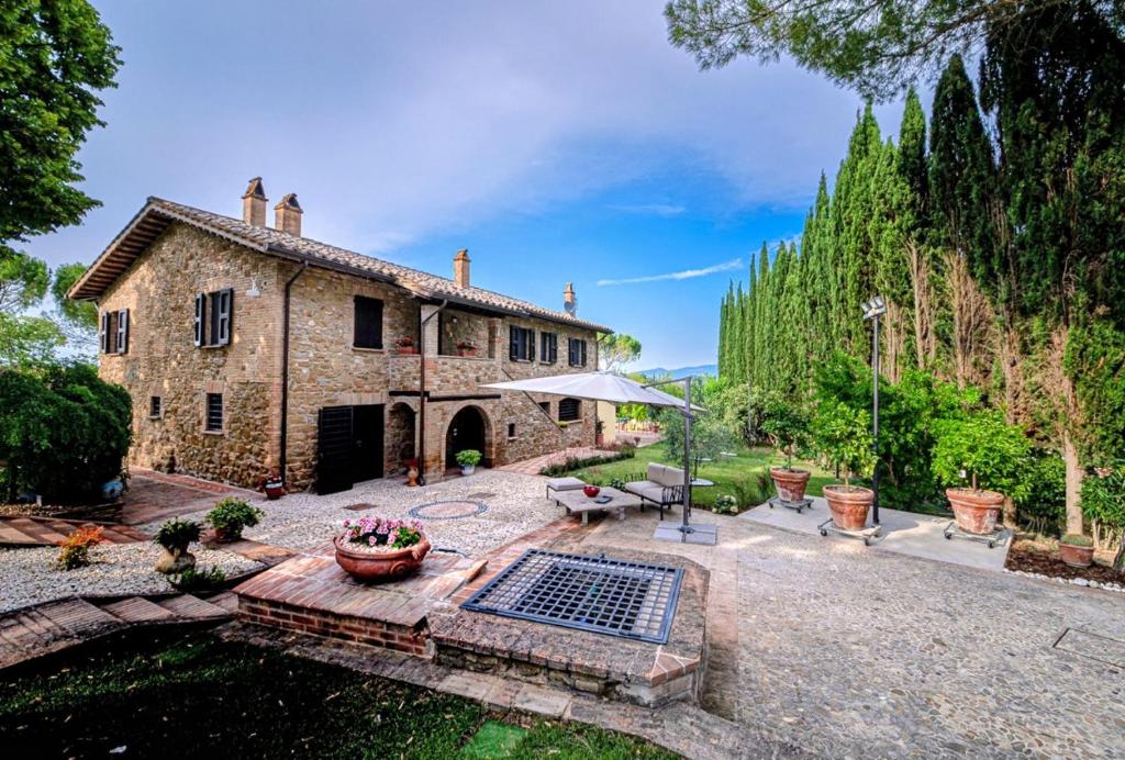 Κήπος έξω από το Podere Fonte Luxury Country House