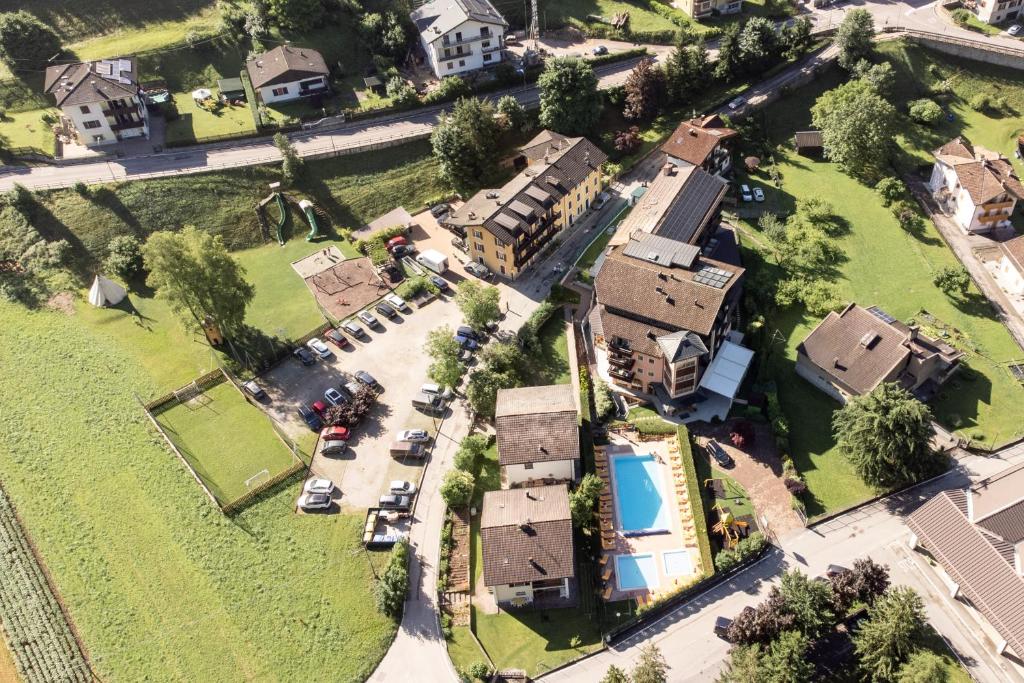 an aerial view of a house with a yard at Family Hotel Adriana in Ledro
