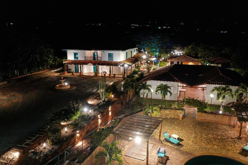 an aerial view of a house at night at Hotel Santos De Piedra - MARANATHA BARICHARA in Barichara
