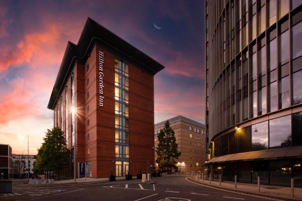 a rendering of a building on a city street at Hilton Garden Inn Birmingham Brindley Place in Birmingham
