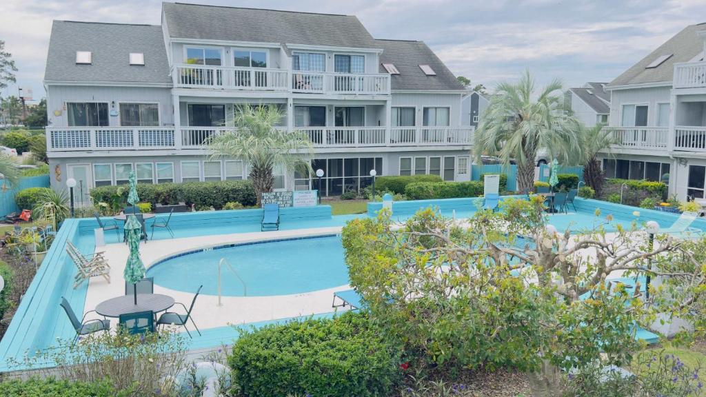 an image of a swimming pool at a resort at Lovely 2 bedroom condo with pool J3 in Little River
