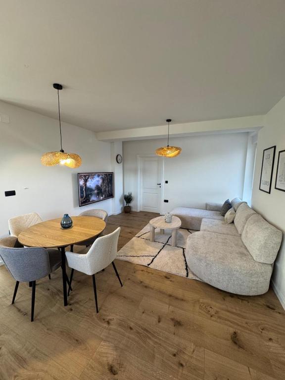 a living room with a couch and a table at Marta Apartment in Čitluk