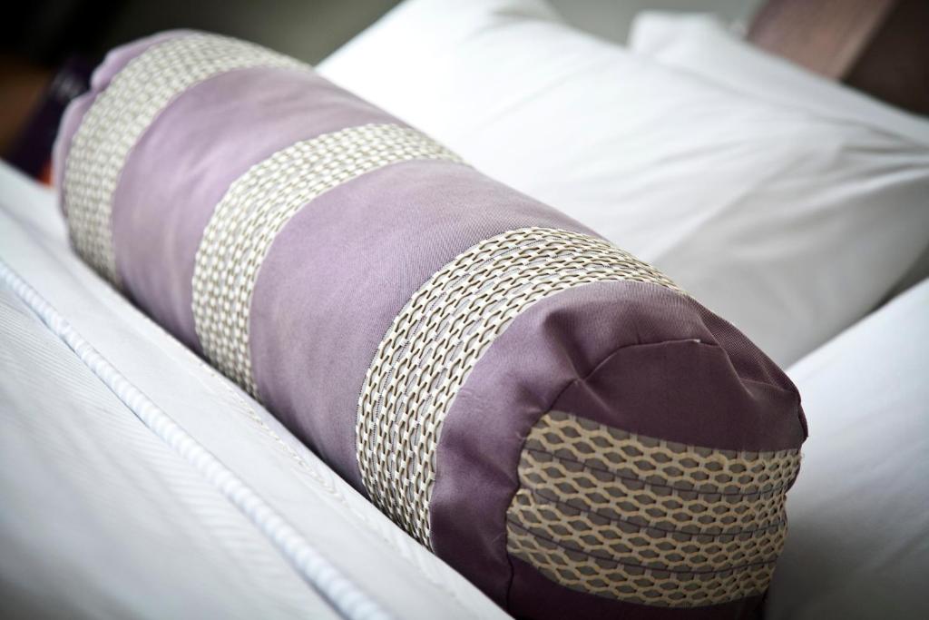 Postel nebo postele na pokoji v ubytování HS HOTSSON Hotel Leon