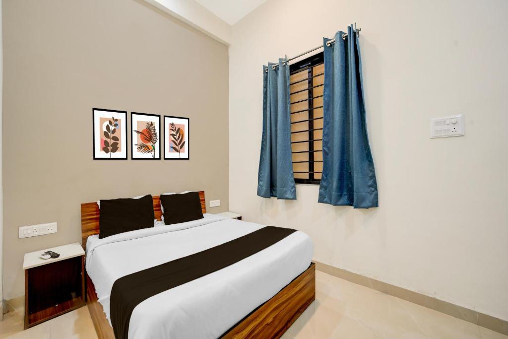 Postel nebo postele na pokoji v ubytování HOTEL O ROYAL DREAM