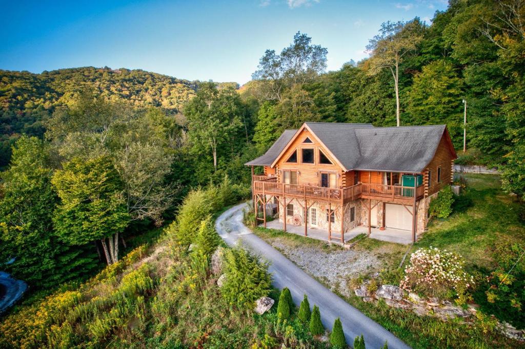 an overhead view of a wooden house in the woods at Sugar Bear Lodge in Banner Elk