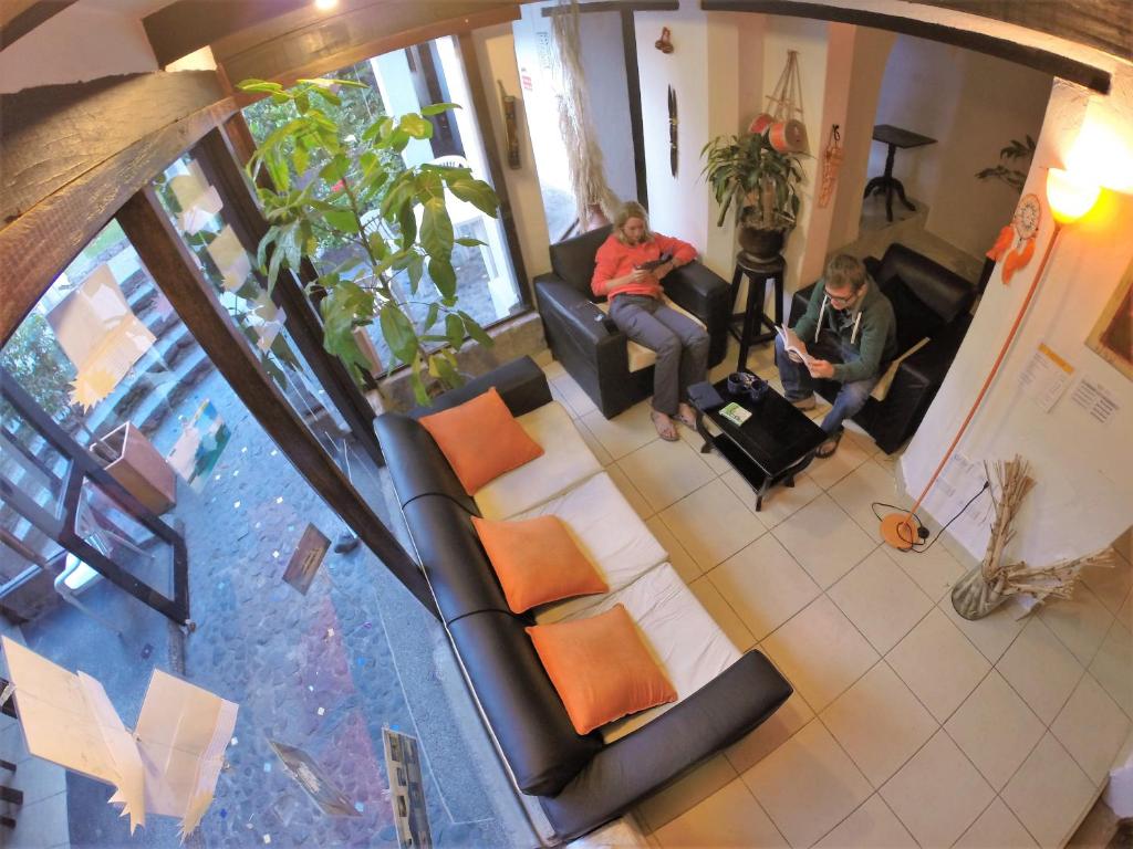 Posezení v ubytování Hostal L'Auberge Inn
