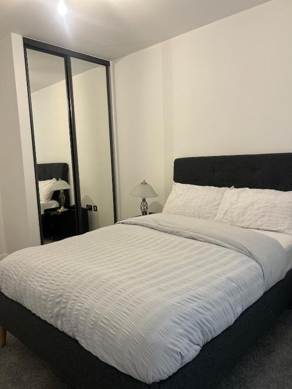 Katil atau katil-katil dalam bilik di Modern Downtown Escape