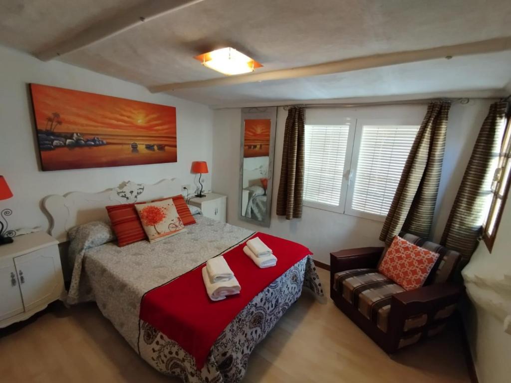 En eller flere senge i et værelse på La Casilla de Nigüelas