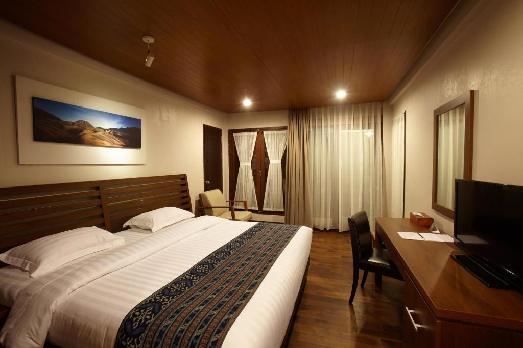 Postel nebo postele na pokoji v ubytování Jiwa Jawa Resort Bromo