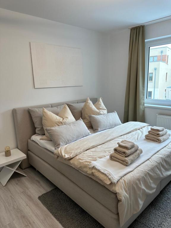 Ένα ή περισσότερα κρεβάτια σε δωμάτιο στο Urban Stay Leipzig