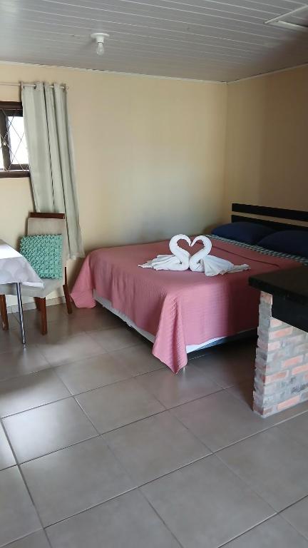 Postel nebo postele na pokoji v ubytování Pousada Costeira Barra do Sul