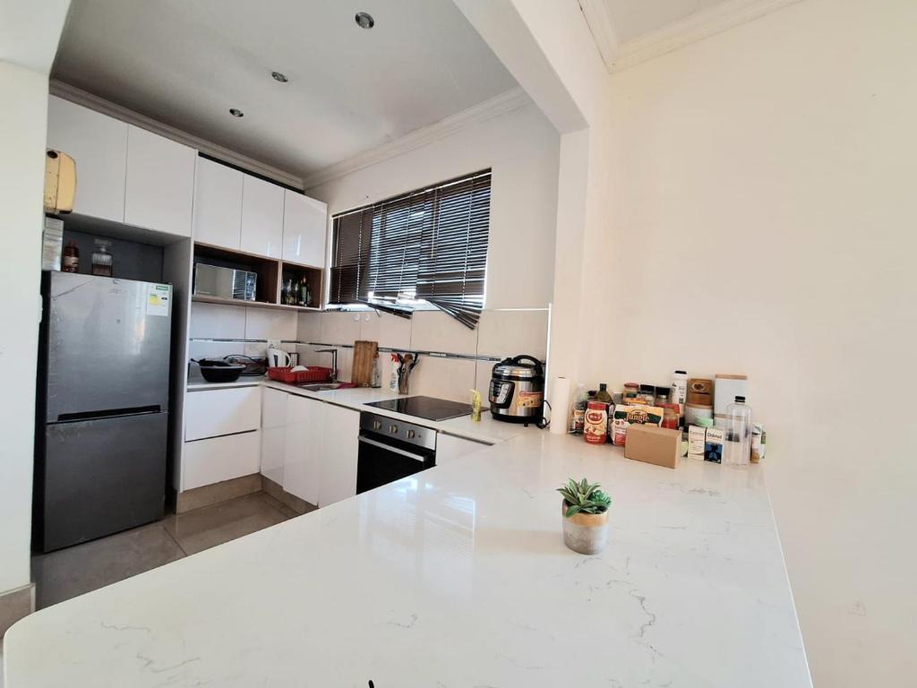 Kuchyň nebo kuchyňský kout v ubytování Coastal Harmony