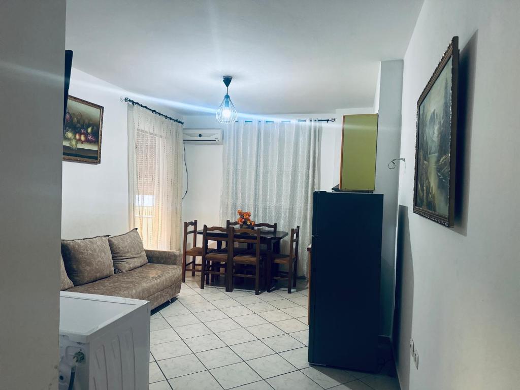 a living room with a couch and a table at Le stanze Della Luna 2 mare in Golem