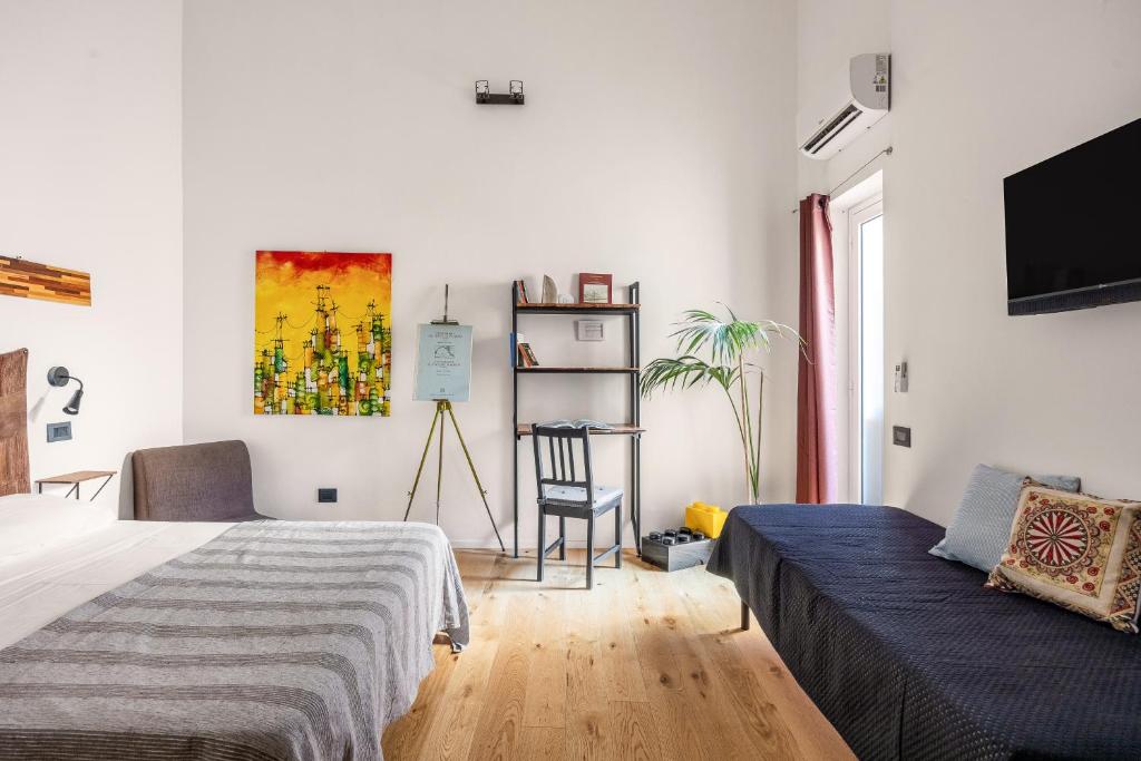 Postel nebo postele na pokoji v ubytování Azizò, la Verde