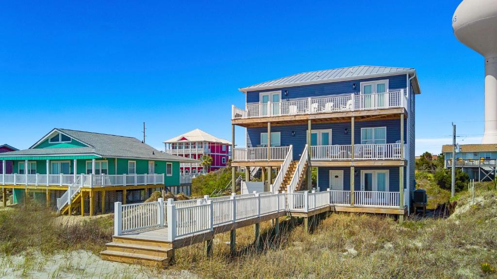 a house on the beach with a water tower at Nautical Skies in Indian Beach