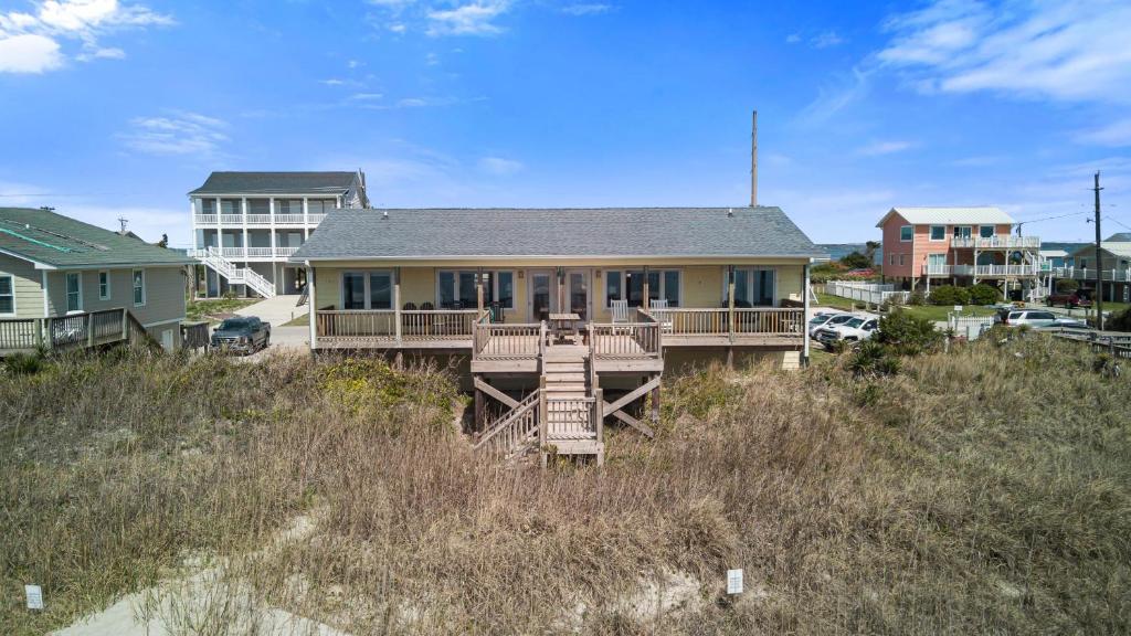 a house sitting on top of a hill at Paradise West in Indian Beach