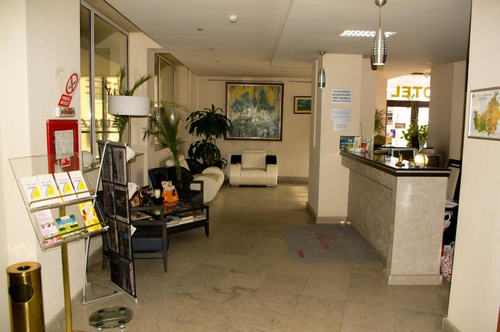 Kuchyň nebo kuchyňský kout v ubytování Hotel Seven