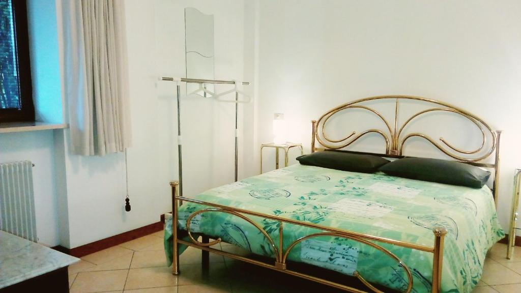 Postel nebo postele na pokoji v ubytování Antico Borgo Leone