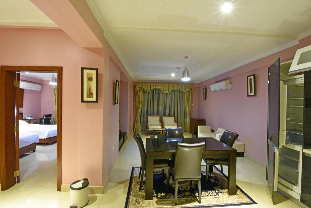 Imperial Golf View Hotel tesisinde bir odada yatak veya yataklar