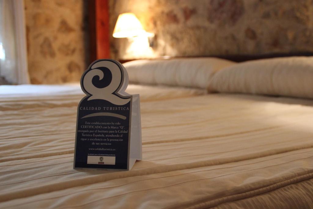 Postel nebo postele na pokoji v ubytování Hotel Microtel Placentinos