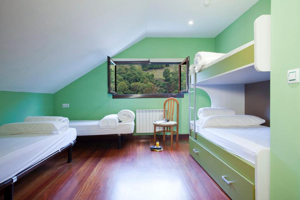 Llit o llits en una habitació de Xabu Hostel