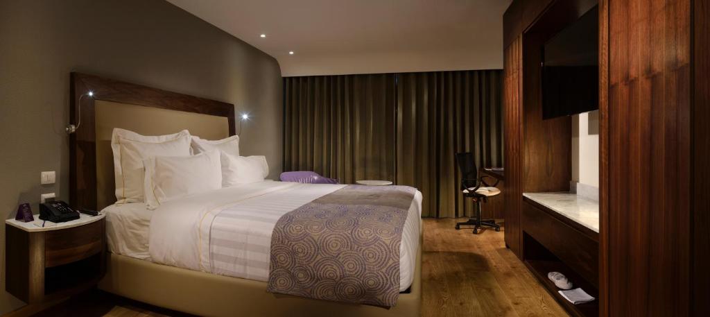 Postel nebo postele na pokoji v ubytování HS HOTSSON Hotel Silao