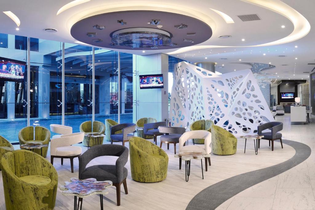 TV a/nebo společenská místnost v ubytování HS HOTSSON Hotel Silao