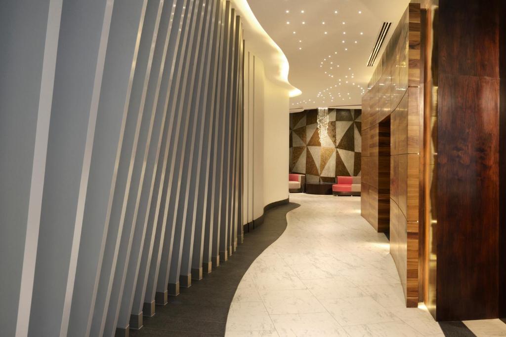 Postel nebo postele na pokoji v ubytování HS HOTSSON Hotel Silao