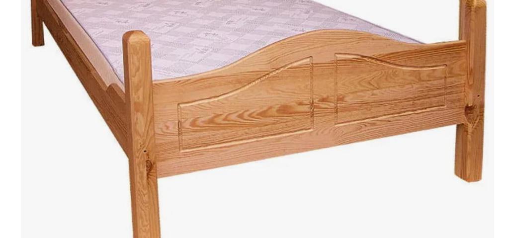 En eller flere senge i et værelse på Mieszkanie