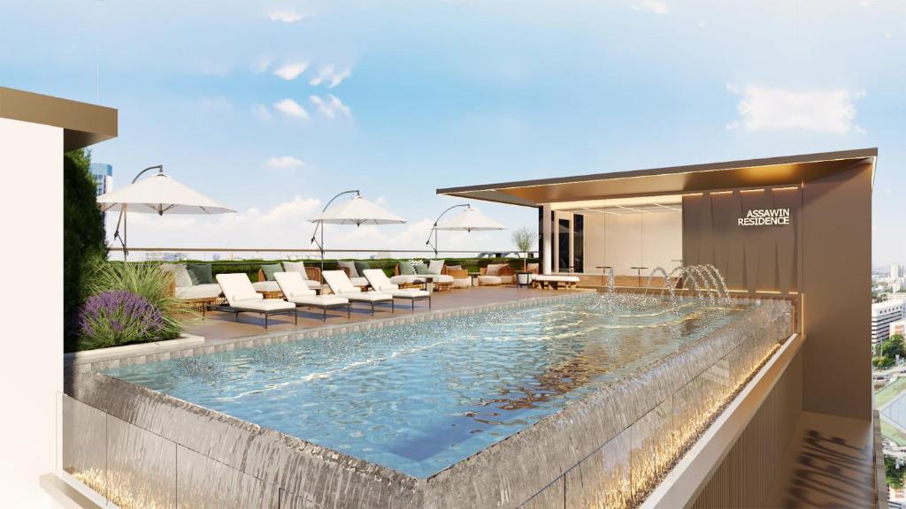 an image of a swimming pool on top of a building at The one ratchaphruek in Ban Nong Bua