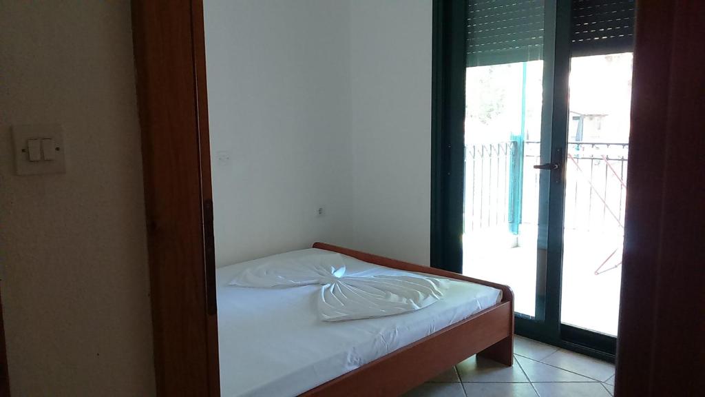 Postel nebo postele na pokoji v ubytování Roxanne villa's