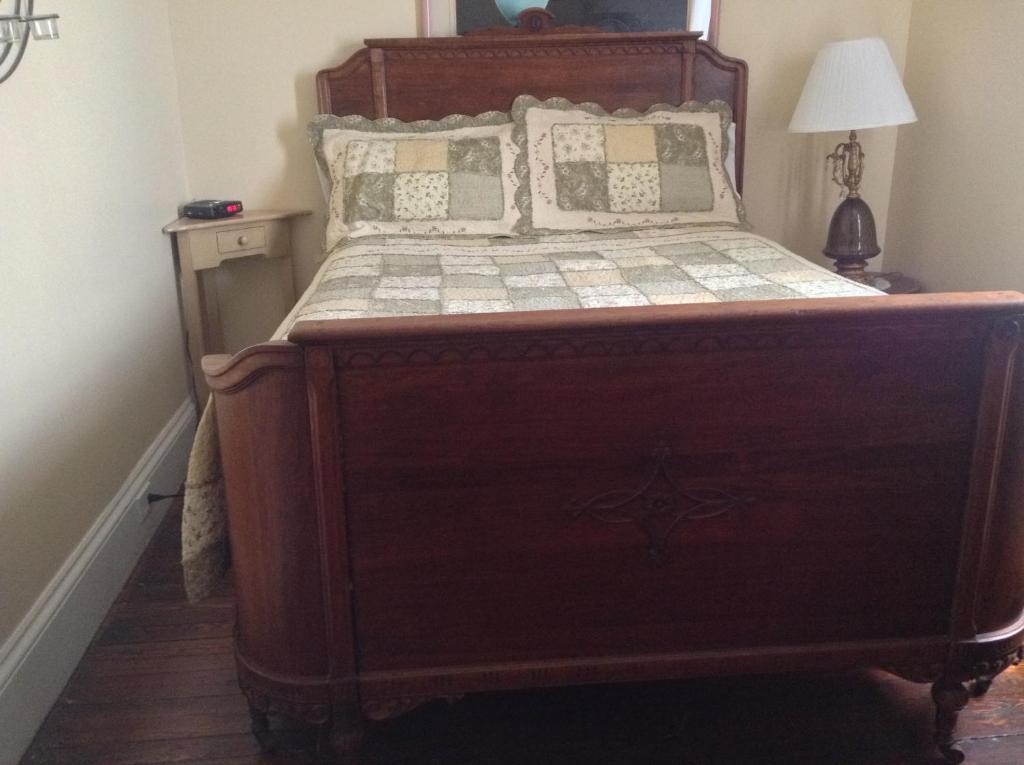 Una cama o camas en una habitación de Gil Ann