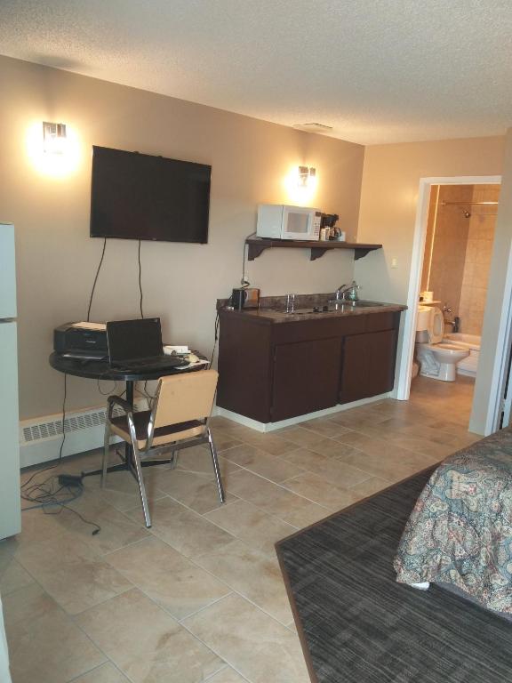 TV a/nebo společenská místnost v ubytování Alaskan Motel