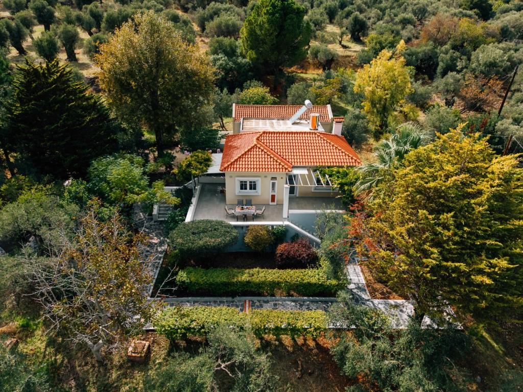 an overhead view of a house with an orange roof at Olive Grove Retreat in Mytilini