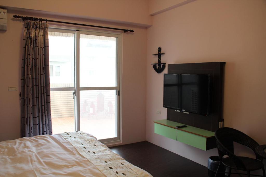 TV a/nebo společenská místnost v ubytování Magi House