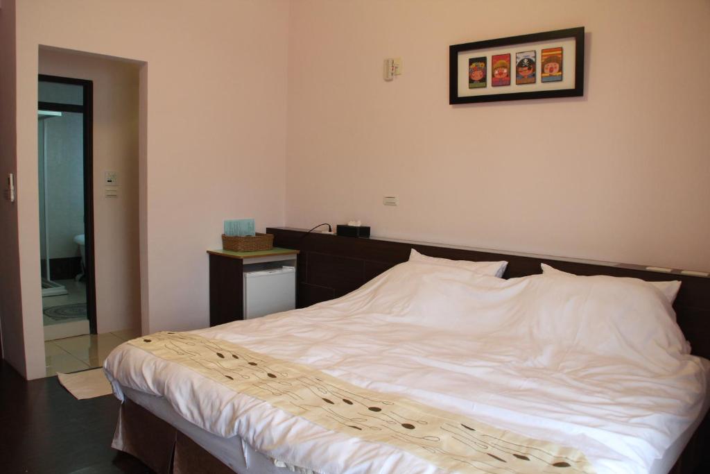 Postel nebo postele na pokoji v ubytování Magi House