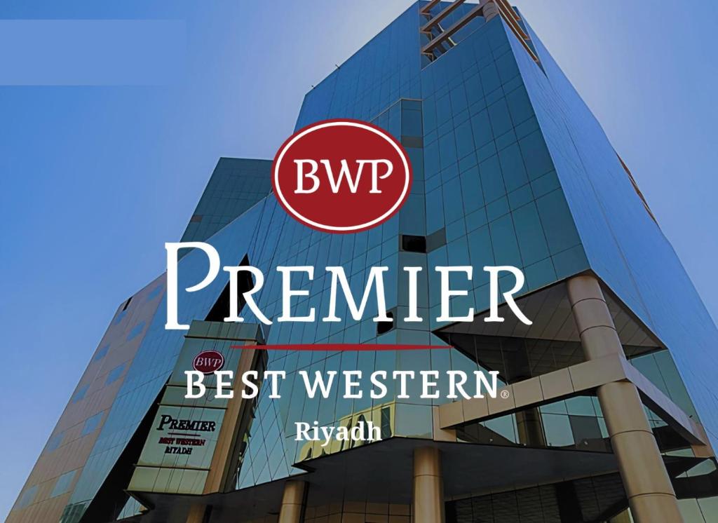 a sign on the side of a building at Best Western Premier in Riyadh