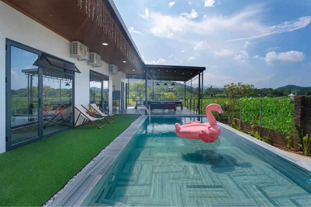 Bazén v ubytování Homestay Mộc trà nebo v jeho okolí