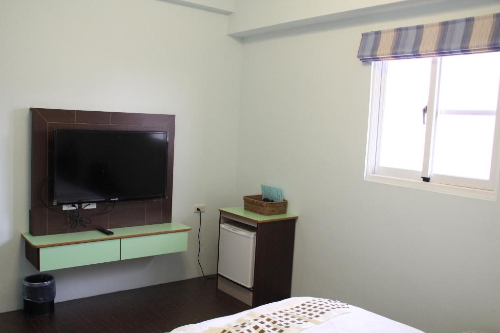 TV a/nebo společenská místnost v ubytování Magi House