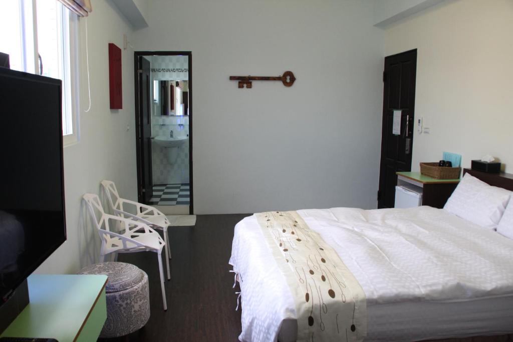 Postel nebo postele na pokoji v ubytování Magi House